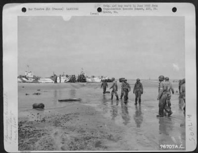 General > Members Of The 834Th Engineer Aviation Battalion Debark From Lct'S (Landing Craft- Tank) At Normandy, France.