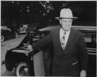 Thumbnail for Photograph_of_Secretary_of_Agriculture_Clinton_P._Anderson,_evidently_arriving_at_the_White_House_for_a_Cabinet_meeting._-_NARA_-_199137.jpg