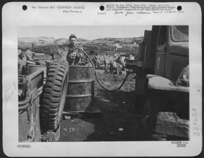 Consolidated > A CORNER FILLING STATION: "Gassing up" in the Aleutians shortly after occupation of an island.