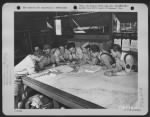 Thumbnail for In a map briefing session at an Airfield, Mareeba, Australia, before going on a mission are left to right: Capt. David W. Hassemer, Operations Officer, 2nd Lt. Jacob H. Franz, Bombardier, Lt. John A. Crockett, Navigator, Lt. Raymond B. Holsey, Pilot - Page 1