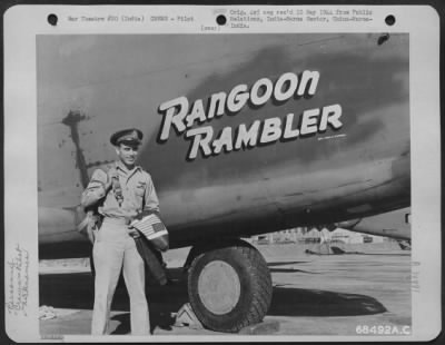 Thumbnail for Consolidated > Capt. Raymond D. Rote, Pilot Of The Consolidated B-24 "Rangoon Rambler" Poses Beside His Plane In India.