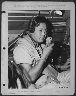 Thumbnail for Consolidated > Radio Operator On A B-29 Of The Xx Bomber Command In India Is Sgt. Masaharu Okinaka, 32, Of Hana, Maui, Hawaii, One Of The First Niseito Participate In Aerial Warfare Against The Japanese.  He Has Been In The Service For Two Years And Overseas For Six Mon