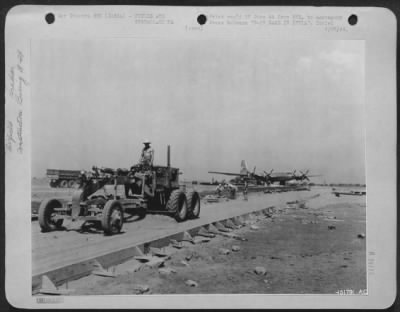 Thumbnail for Consolidated > B-29 Base In India -- A Grader At Work On A Taxi Strip Which Is Being Constructed For The B-29 Superfortresses At A U.S. Army 20Th Bomber Command Base Somewhere In India.  Thousands Of Cubic Yards Of Concrete Were Used In Building Strips Thick Enough And