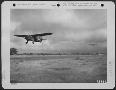 Thumbnail for Consolidated > An Aeronca Tg-5 Light Glider Of The 1St Air Commando Group Is Towed By A Noorduyn C-64 Norseman While On A Practice Flight Over Asansol, India.  14 August 1944.