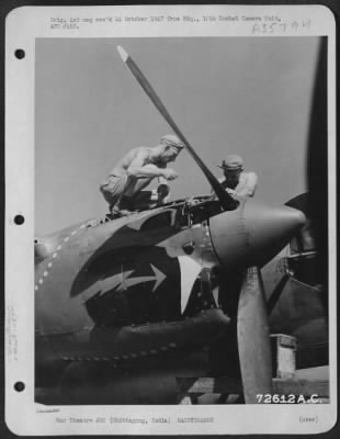 Consolidated > Ground Crew Members Of The 459Th Fighter Squadron, Nicknamed The 'Twin Dragon Squadron', Are Giving One Of Their Lockheed P-38'S A 'Check Up' At An Air Base In Chittagong, India.  January 1945.