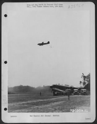 Thumbnail for Consolidated > Taihpa Ga, Burma. While Unarmed Douglas C-47'S Of The 1St And 2Nd Troop Carrier Squadron Drop Food To Our Fighting Men, The Wounded Are Evacuated In Unarmed Planes. At Times This Picture Was Taken, The Enemy Was Only Ten Minutes Away By Fighter Plane. 5 M