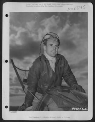 Thumbnail for Consolidated > Lt. Burnor, pilot of the 90th Photographic Reconnaissance Wing, poses in the cockpit of his Lockheed F-5 at an air base somewhere in North Africa.