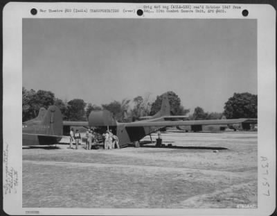 Consolidated > Enginneers Load A Bulldozer On A Glider Of The 1St Air Commando Force At Lalaghat, India.