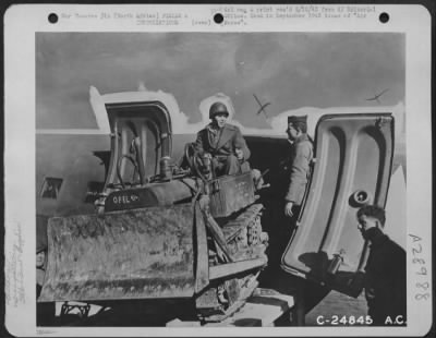 Consolidated > North Africa-Unloading a bulldozer from a transport.