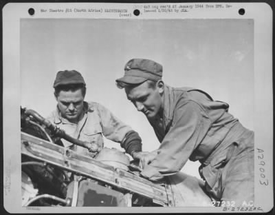 Thumbnail for Consolidated > North Africa-Three pilots of an AAF Fighter Group in the 12th AF Air Support Command owe their lives to these two S/Sgts. From Penn., Sgt. Wm. E. Booth, left and Sgt. George E. Siple of Harrisburg, Pa. On one occasion recently the two men, both crew