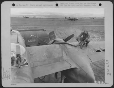 Consolidated > Pvt. Robert B. Carlson of Duluth, Minnesota, a member of the 310th Bomb Group, gasses a North American B-25 with a 4,000 gallon refilling unit at Berteaux, North Africa. 7 March 1943.