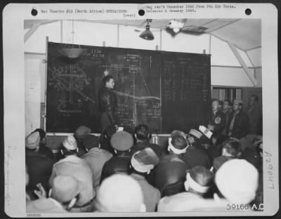 Consolidated > 9Th Air Force Crew Members Based In North Africa Being Briefed Before A Mission.  1943.