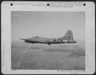 Thumbnail for Consolidated > Tunis, Tunisia-A German fighter plane whose pilot had been killed, crashed into this Boeing B-17 "Flying Fortress" while it was bombing Nazi supply lines in North Africa. The fuselage was out half into, and one elevator was torn away. S/Sgt. Sam