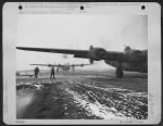 Thumbnail for Consolidated B-24 "Liberators" after landing in a snow storm after a raid. Aleutian Islands. SCR-621. - Page 1