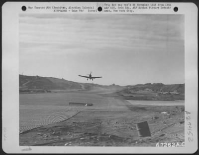 Thumbnail for Consolidated > A Curtiss P-40 takes off from a fighter stirp at its 11th Air Force base near Amchitca, Aleutian Islands. 12 October 1943.