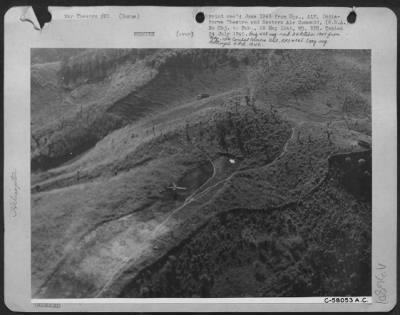 Thumbnail for Consolidated > An Aerial View Of The Mountain Top In The Naga Hills In Burma Showing The Yr-4 Helicopter About To Land.  The Wounded Enlisted Man, Who Was Shortly To Be Rescued, Was Assigned To A 10Th Af Weather Station At The Other End Of This Rough Strip.