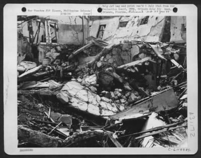 Thumbnail for Consolidated > Bomb damage to a section of the Baguio General Hospital. This building was being was being used as Japanese Headquarters. Luzon Island, Philippine Islands. 20 July 1945.