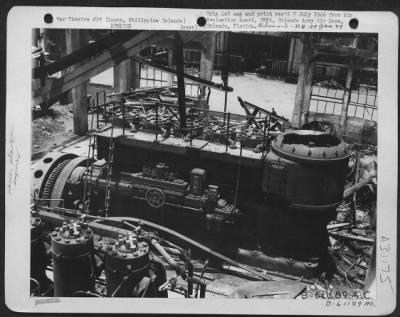 Thumbnail for Consolidated > As the result of instantaneously fuse bombs, both of these diesel engines in the power plant have been put out of action, but are repairable. 20 July 1945. Baguio, Luzon, Philippine Islands.