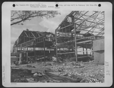 Thumbnail for Consolidated > Jap "Betty" planes inside a hangar on clark field were bombed and strafed during the battle to recapture Clark Field and the surrounding area. Luzon, Philippine Islands.