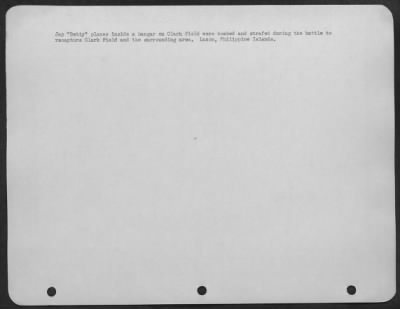 Consolidated > Jap "Betty" planes inside a hangar on clark field were bombed and strafed during the battle to recapture Clark Field and the surrounding area. Luzon, Philippine Islands.