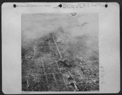 Consolidated > Bomb damage at Manila, Philippine Islands. 15 February 1945.