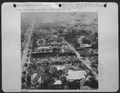 Consolidated > Bomb damage at Manila, Philippine Islands. 15 February 1945.