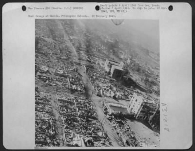 Consolidated > Bomb damage at Manila, Philippine Islands. 15 February 1945.