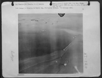 Thumbnail for Consolidated > Bomb damage to shipping in Manila Bay, Philippine Islands. 15 February 1945.