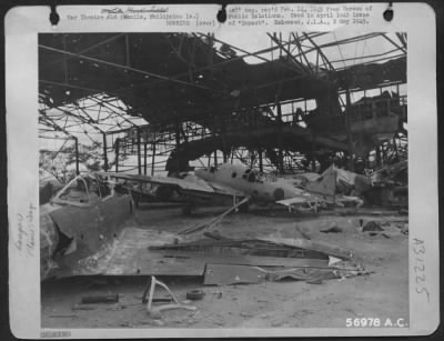 Thumbnail for Consolidated > Manila, Philippine Islands-Here is what it looked like inside one of Clark Field's hangars after attacks by AAF bombers.