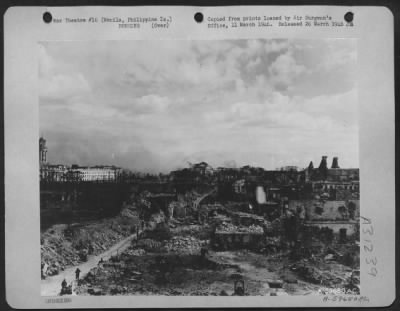 Consolidated > Bomb damage to government buildings in Manila, Philippine Islands, Feb. 1945.