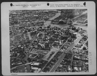 Consolidated > Bomb damage to the busniess district of Manila, Philippine Islands, Feb. 1945.