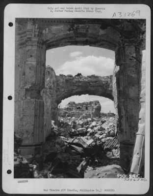 Consolidated > Bomb damaged buildings on Manila, Philippine Islands. 22 April 1945.