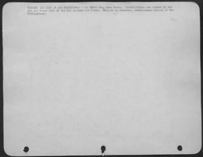 Consolidated > BOMBING THE JAPS IN THE PHILIPPINES-At Santa Ana, near Davao. Installations are bombed by the 5th Air Force unit of the Far Eastern Air Force. This is on Mindanao, southernmost island of the Philippines.