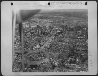 Consolidated > Destruction in South Manila, Philippine Islands.