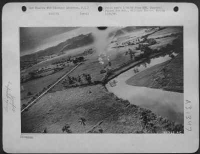 Consolidated > Bombing of Surigoo Airdrome by low flying North American B-25's & Douglas A-20's of the Fifth Air Force prior to General MacArthur's landing on Luzon, R.I. on 9 Jan 45.