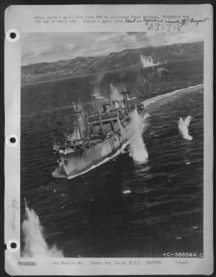 Thumbnail for Consolidated > DISASTER FOR JAP CONVOY AT ORMOC BAY--This Japanese vessel, carrying a deck load of material and ducking Japs, is the target of bombs from B-25s of the Far East Air Forces which are attacking a Jap convoy trying to reinforce the big base at Ormoc