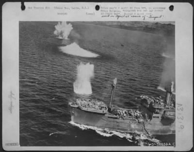 Thumbnail for Consolidated > DISASTER FOR JAP CONVOY AT ORMOC BAY--This Japanese vessel is in serious trouble with bomb bursts geysering near it. It is part of a convoy trying to reinforce the big base at Ormoc, Leyte, P.I., but now in Ormoc Bay, is under attack by B-25s, P-38s