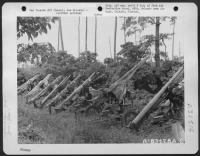 Thumbnail for Consolidated > View showing Japanese anti-aircraft guns type 88, 75 mm along Simpson Harbor, Rabaul, New Britain. 8 November 1945.