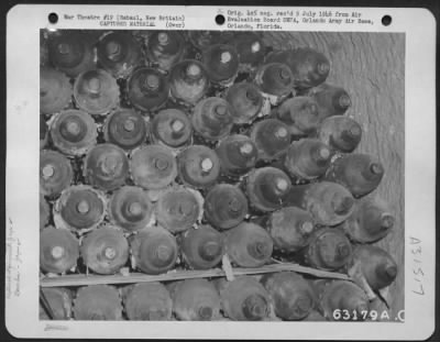 Thumbnail for Consolidated > Found stored in an underground tunnel 250 miles in length were these Japanese bombs. Tunnel was also used for housing and storing of supplies and food. Rabaul, New Britain, 8 November 1945.