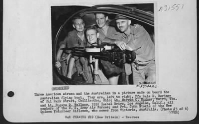 Thumbnail for Consolidated > Three American airmen and the Australian in a picture made on board the Australian flying boat. They are, left to right, Pfc Dale E. Bordner of 241 Park Street, Chillicothe, Ohio; Lt. Marvin C. Hughes, Baird, Tex. And Lt. Eugene D. Wallace, 3352