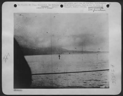 Thumbnail for Consolidated > North American B-25 goes down from LST gunfire on 26 Dec 43 off Caps Gloucester, New Britain. A North American B-25 squadron approaching Natamo Point targets, had opened fire on a Jap "Val" which crossed its path.