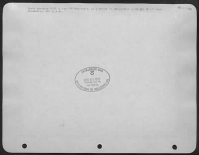 Consolidated > North American B-25 is just hitting water, as a result of LST gunfire on 26 Dec 43 off Cape Gloucester, New Britain.