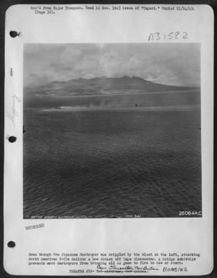 Thumbnail for Consolidated > Even though the Japanese destroyer was crippled by the blast at the left, attacking North American B-25s deliver a bow attack off Cape Gloucester. A bridge amidships prevents most destroyers from bringing all AA guns to fire to blow or stern.