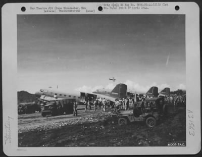 Thumbnail for Consolidated > Gi'S Unload Douglas C-47S On An Airstrip At Cape Gloucester, New Britain.  6 February 1944.