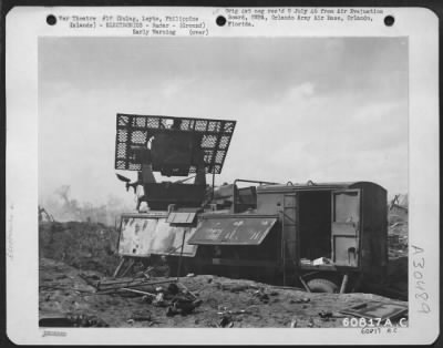 Consolidated > When a Japanese airplane bombed the adjacent ammunition dump on Dulag beach, this radar equipment was damaged by fragments of the explosion. Leyte, Philippine Islands, 2 November 1944.