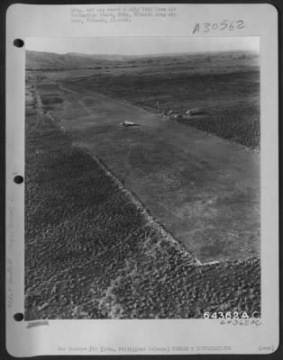 Thumbnail for Consolidated > Carmen Strip on Pohol, Cebu, Philippine Islands which may have been used by Japanese for staging of air attacks against Leyte when American forces landed there. Part of this strip was in sufficiently good repair for Curtis C-46s and Douglas C-47s to