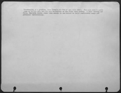 Consolidated > Housekeeping is a problem, this "Jungle Air Force" man will admit. The rain didn't quite come up to his cot, but all his belongings on the floor were soaked. A fast-moving air force, the 13th rarely stays long enough on one island to build