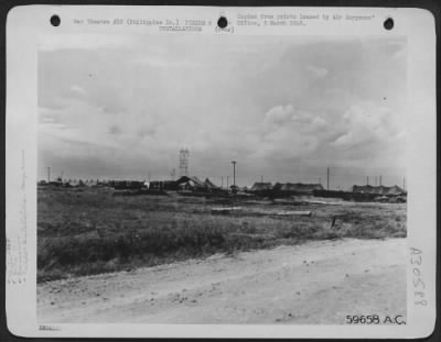 Thumbnail for Consolidated > Nielson Field, Manila, 11 May 1945. Co. "C," 264th Medical Bn. "Holding Company." General view of the company's area. All housing is in tents. Patients are evacuated by air to this holding company and from here they are taken to a General Hospital.