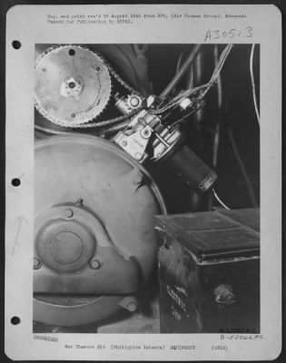 Consolidated > The speed control unit installed on the U.S. varidrive testometer showing the actuator assembly, oil cooler flap with chain drive and sprocket. This testometer was designed by T/Sgt. George W. Clark Stationed in the Philippine Islands.