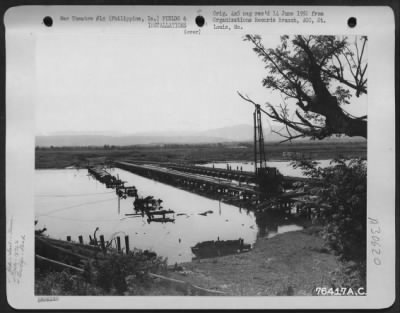 Thumbnail for Consolidated > View of bridge near Tuguegarao, Luzon Island, Philippines after completion by "A" Co., 1876th Eng. Aviation Battalion. 7 August 1945.